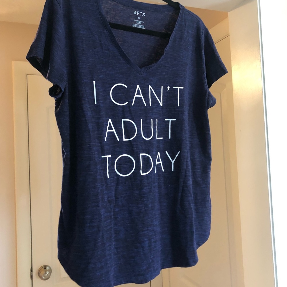 Blue t shirt with I can’t adult today, script.